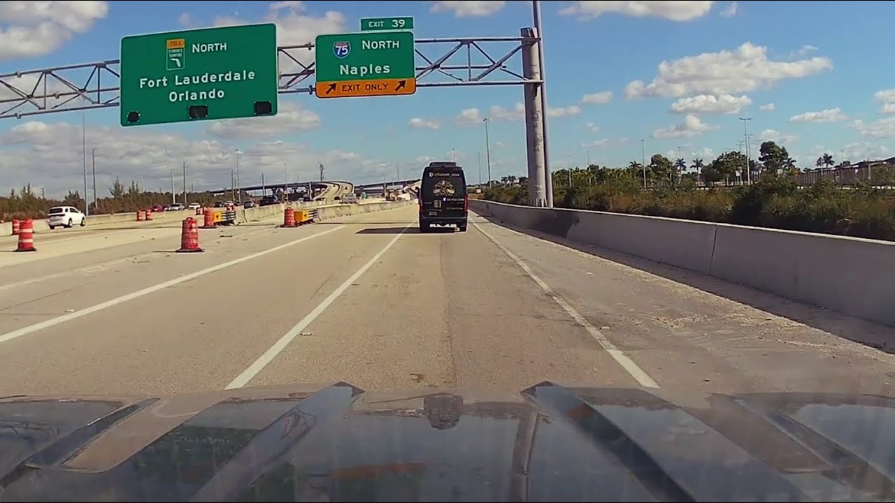 Driving in Miami on the Turnpike northbound towards I75. Light traffic.