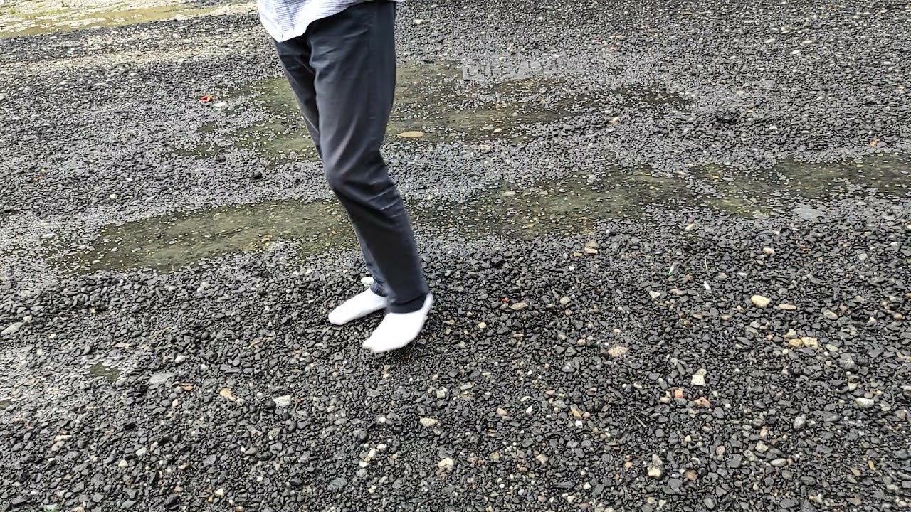 Walking in puddles with wet white socks