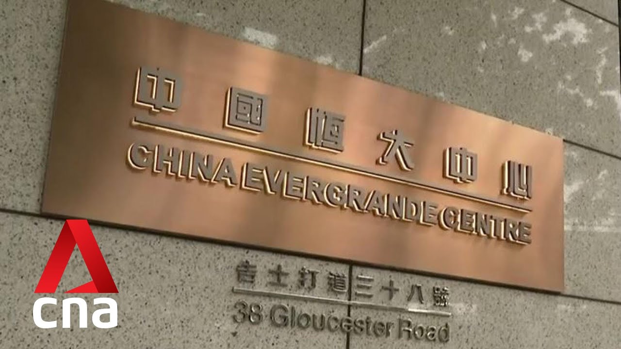 Debt-laden property developer Evergrande's chairman says firm will 'walk out of its darkest moment'