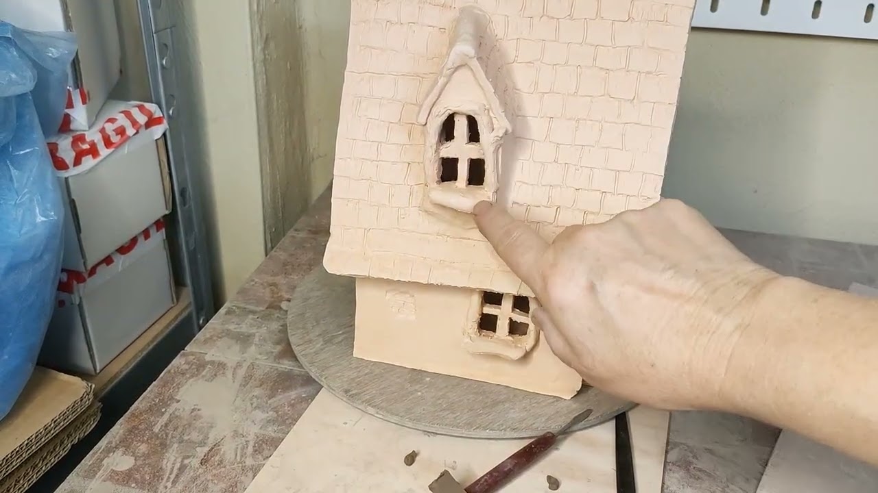 How to make windows in a pottery fairy house.