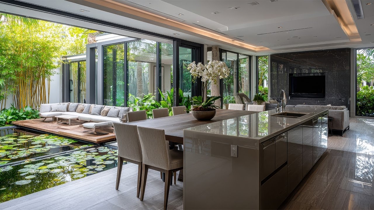 Contemporary Entertaining HPL Kitchen Design with Courtyard Garden Inspired by Wood-Mode Cabinetry
