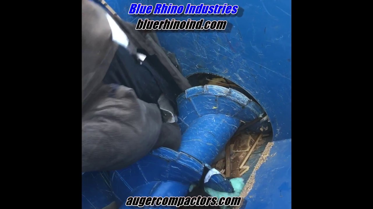 Crushing Sofas with a Blue Rhino Auger Furniture Compactor