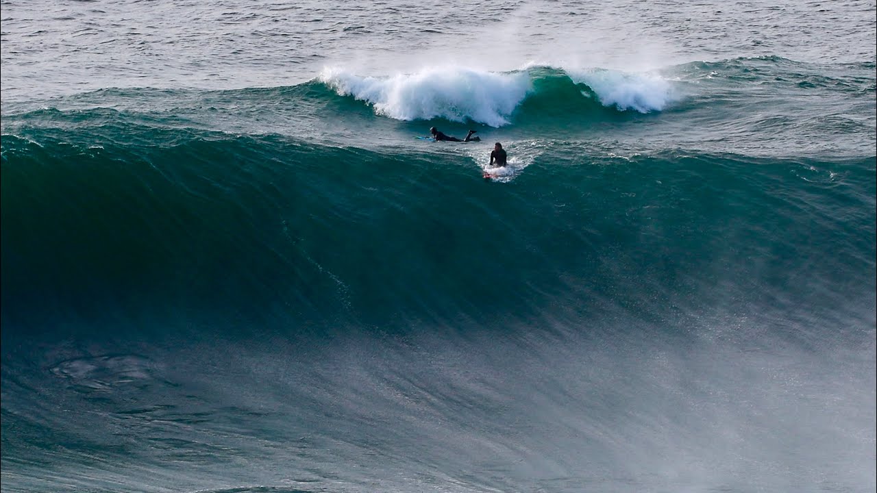 PADDLING BETWEEN GIANT WAVES SURFING EERIE OUTER REEF IN EUROPE!