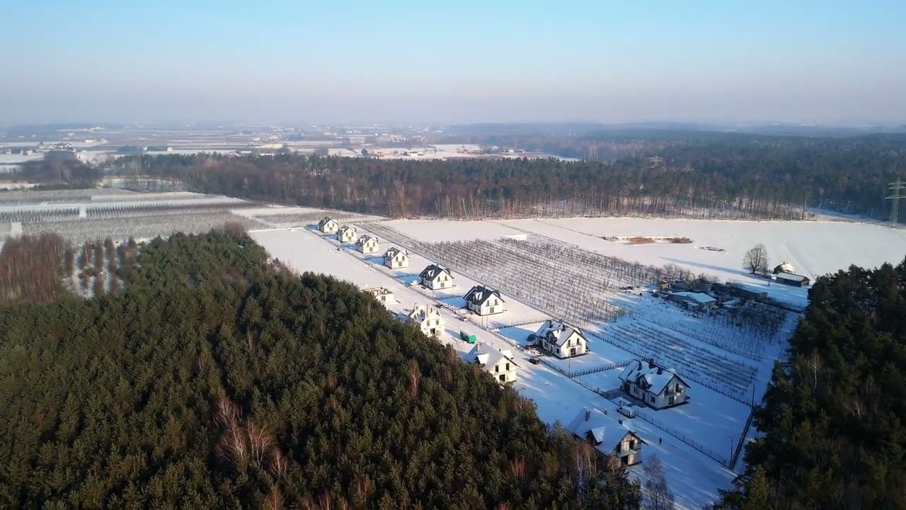 Inwestycja Osiny zimą z lotu ptaka | Nowoczesne domy 182 m² na południe od Warszawy 