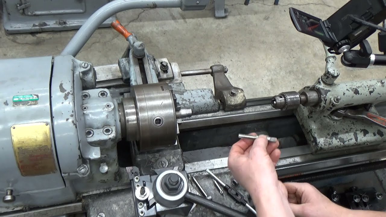 Tapping holes on metal lathe
