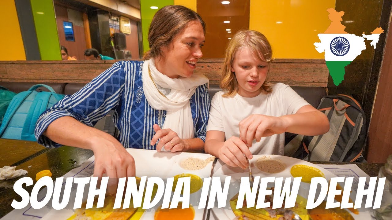 NZ FAMILY TRYING SOUTH INDIAN FOOD AT SARAVANA BHAVAN: Connaught Place, New Delhi - India.