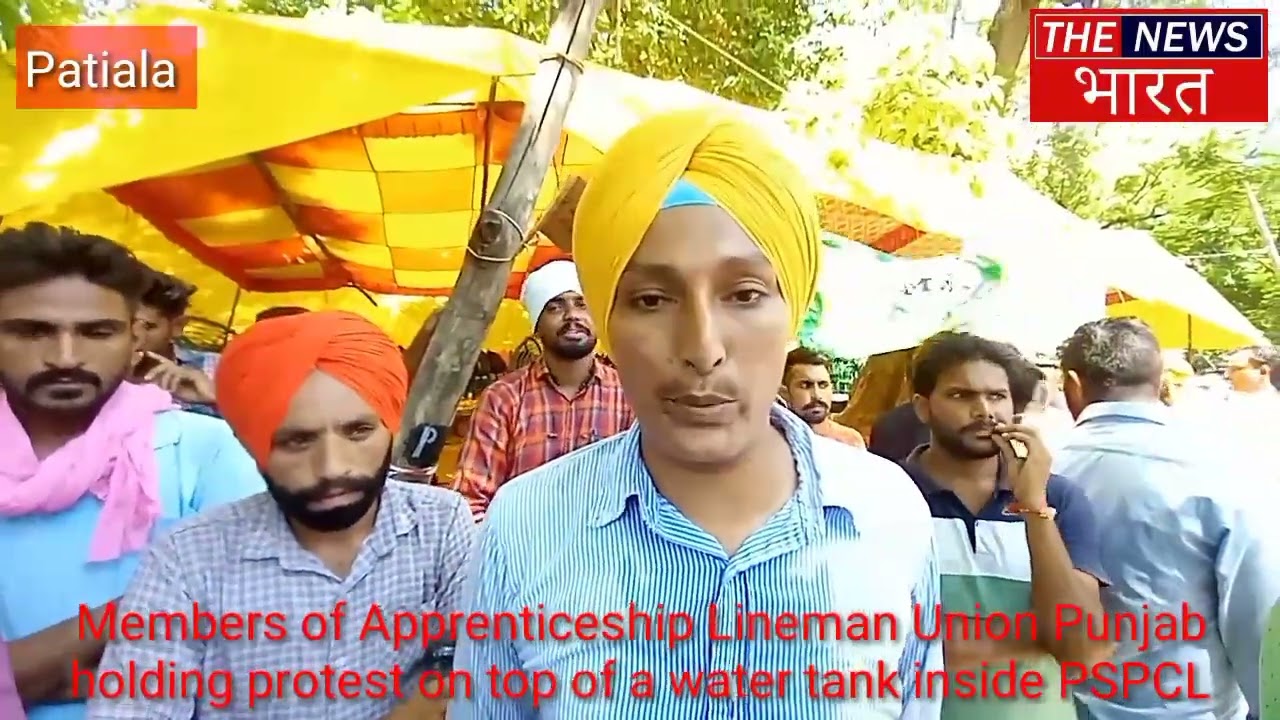 Members of Apprenticeship Lineman Union Punjab holding protest on top of a water tank inside PSPCL