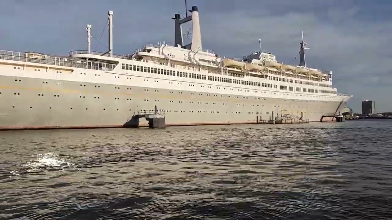 tourist tip by super fast water taxi to the SS Rotterdam and the skyline of Rotterdam, in ultra HD