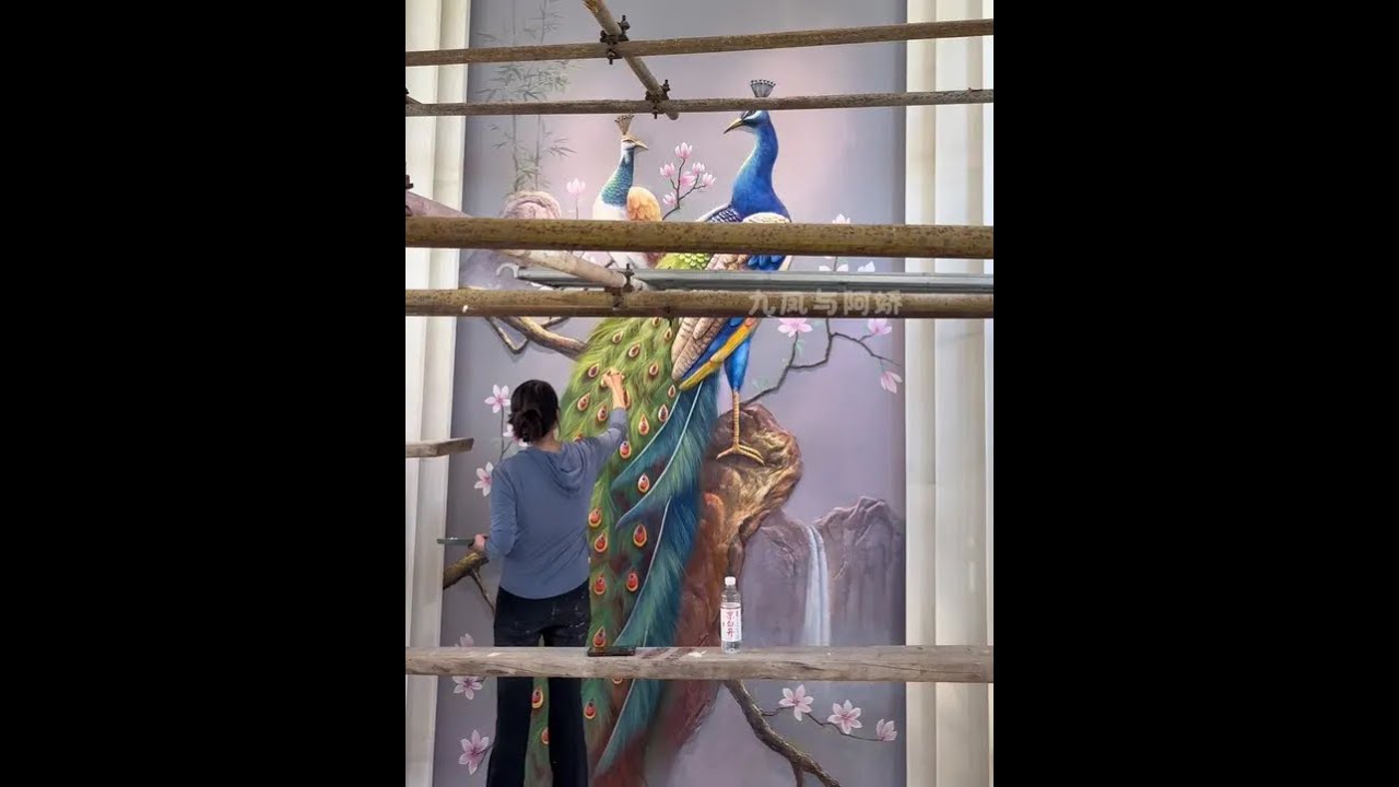 Peacock symbolizes good luck and wealth in relief painting