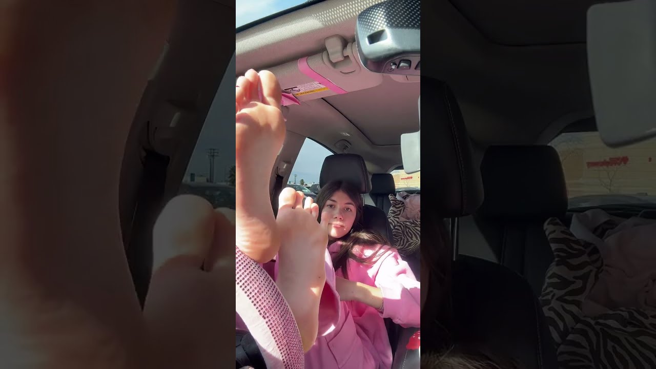 White girl showing off perfect soles 