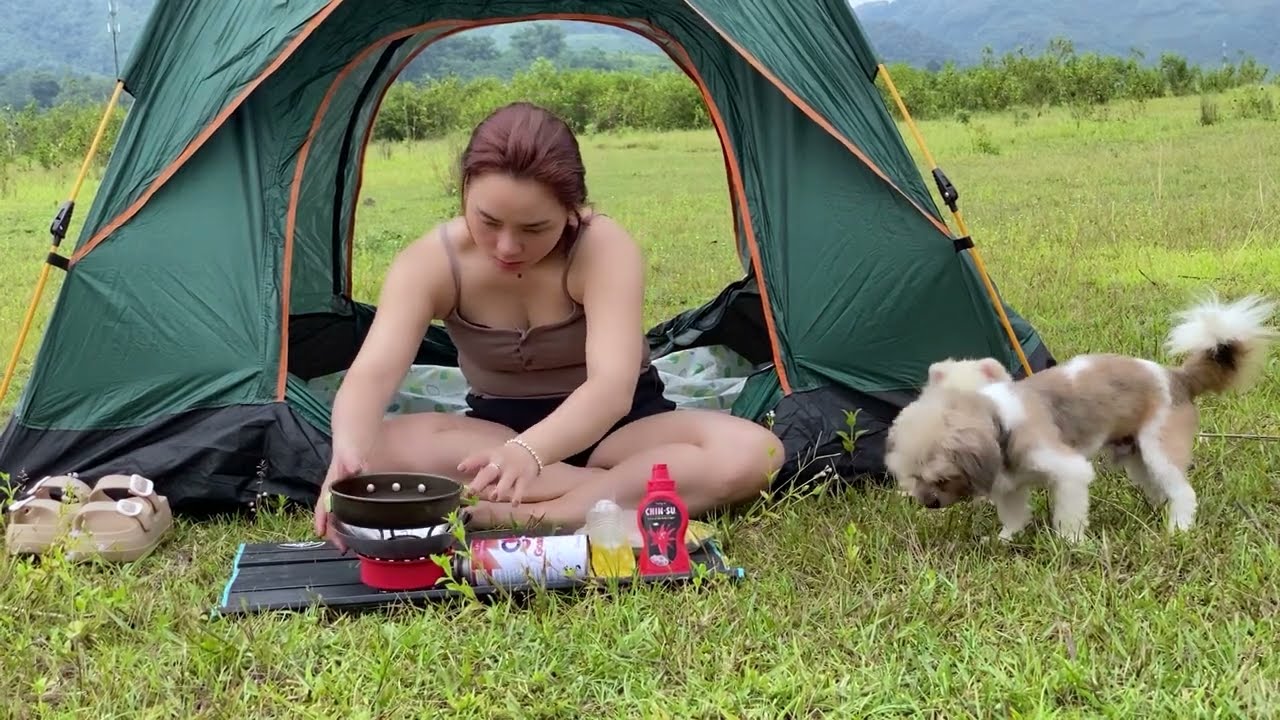 Camping deep in the forest - enjoying a delicious meal and then going to sleep