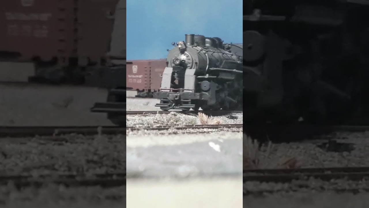 N de M 1182 2-8-0 coming around with a small freight