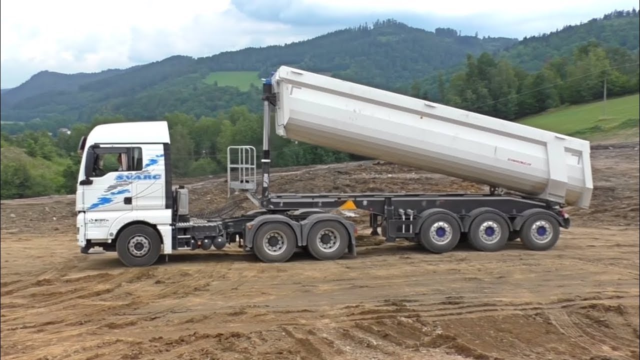 Man TGX and Volvo EW160C