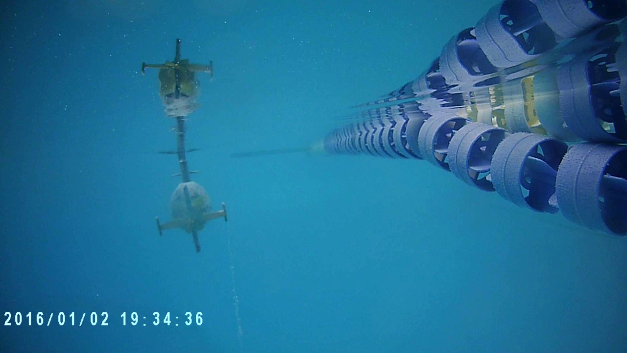 Use of towed camera to video submerged model submarine
