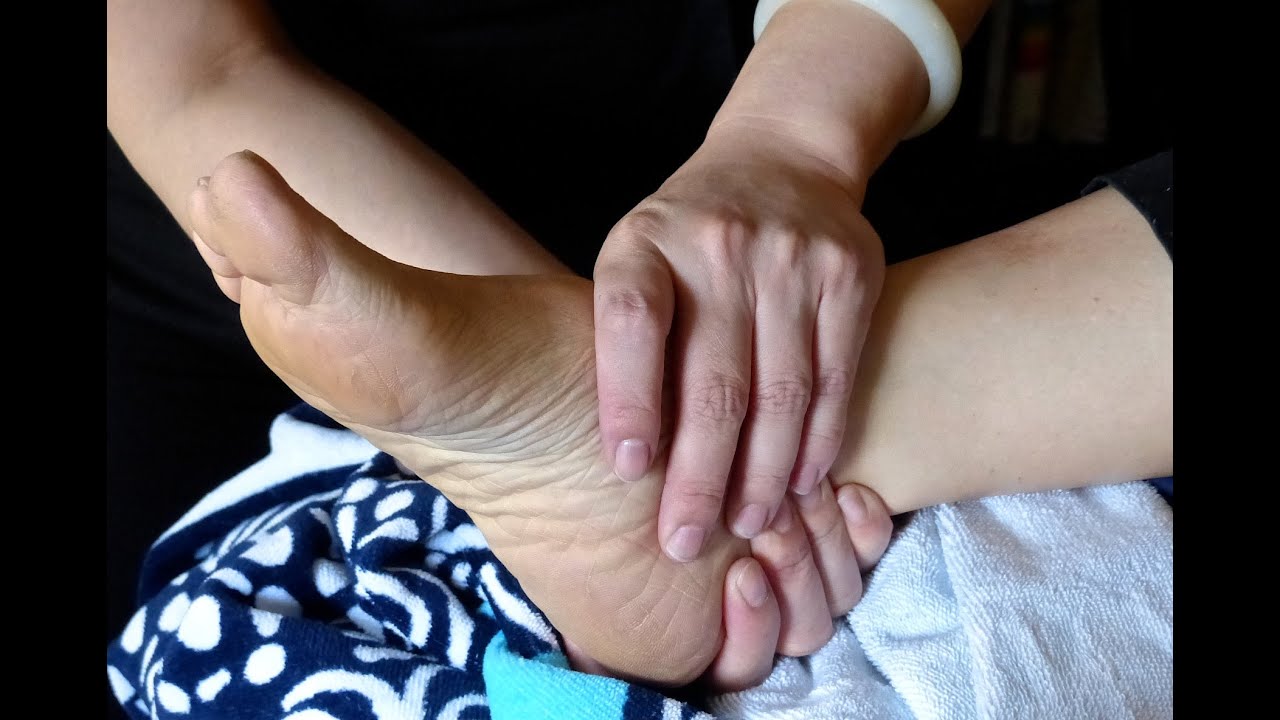 Jessica practices COMFORT TOUCH® of the Feet