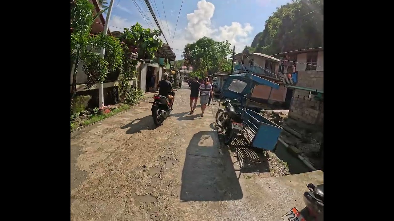 Walking in El Nido town after rain, daily life Philippines