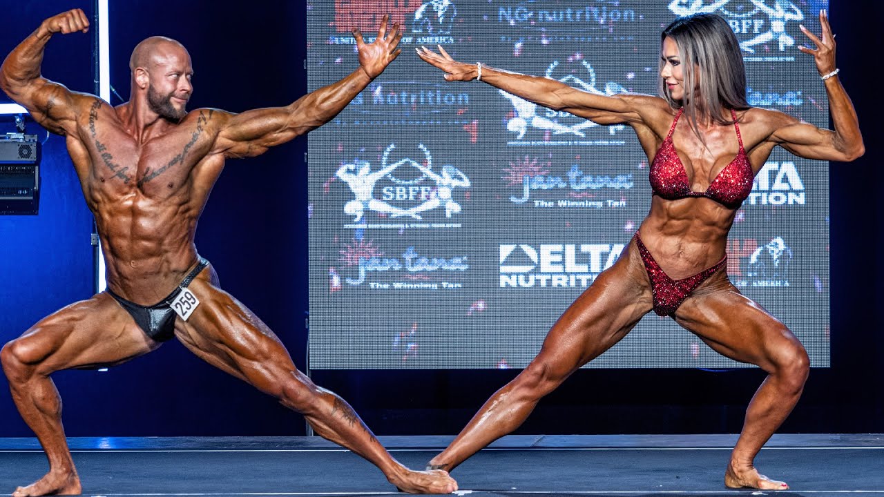 Beautiful Bodybuilding Couple Posing - Nailing the IFBB Logo Pose