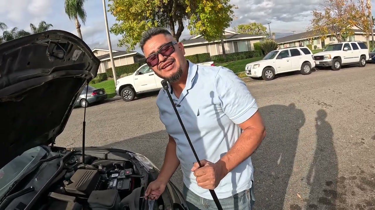 Cambio de amortiguadores capo toyota camry  2009.