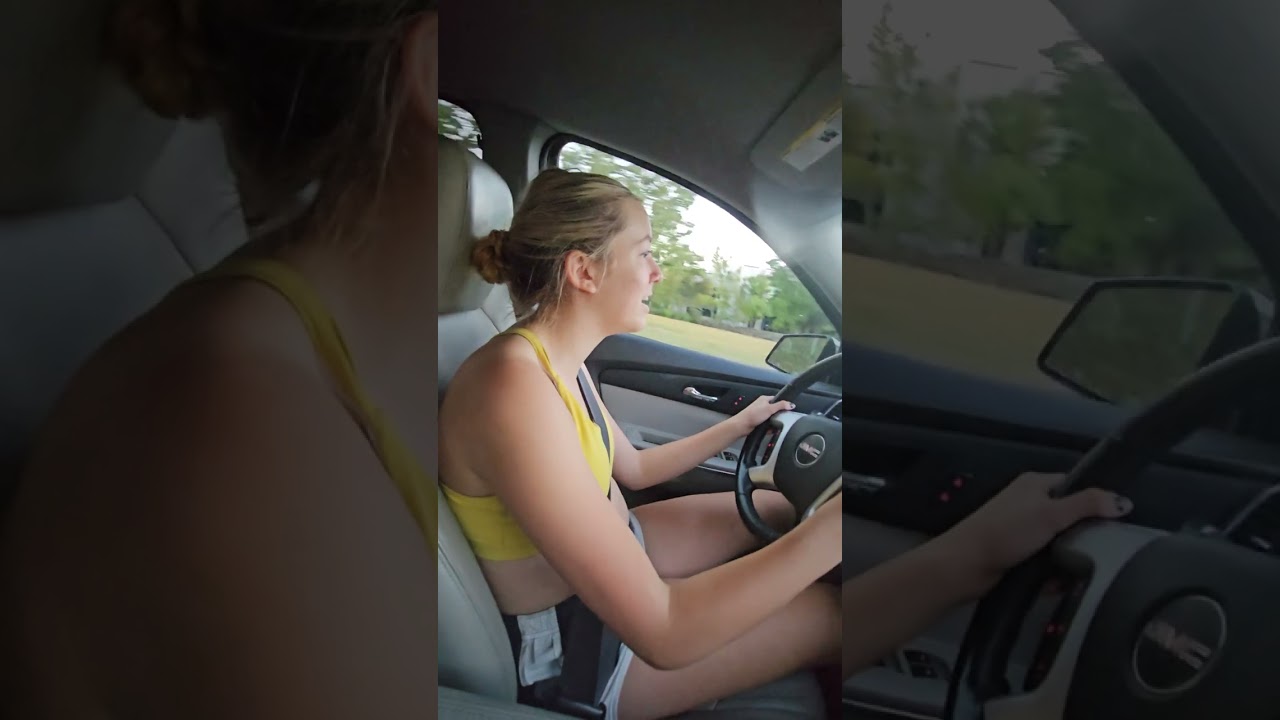 Taylia driving the Acadia