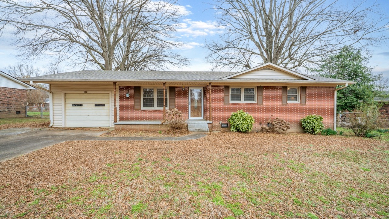 Turn-Key 3 Bed Brick Home in Rolling Meadows | 5061 Caldwell Dr, Milan | Sunroom + Fenced Backyard