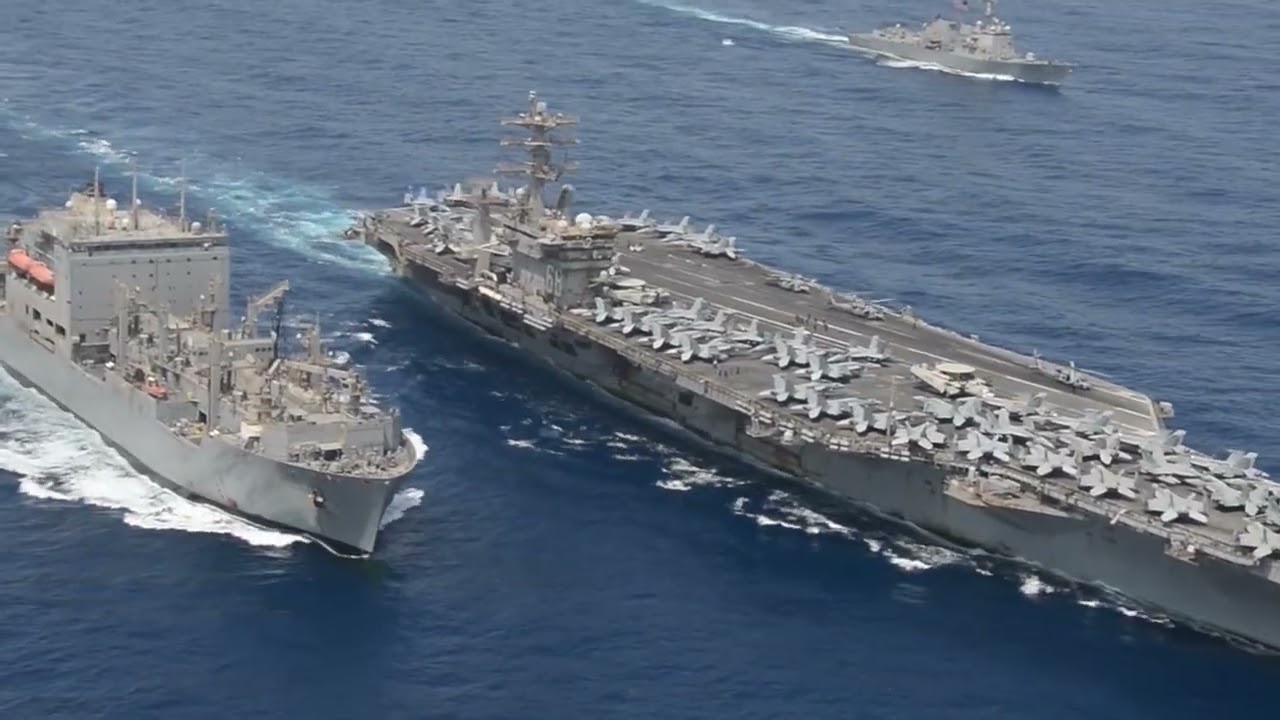 The Nimitz class aircraft carrier USS Nimitz CVN 68 conducts a replenishment at sea