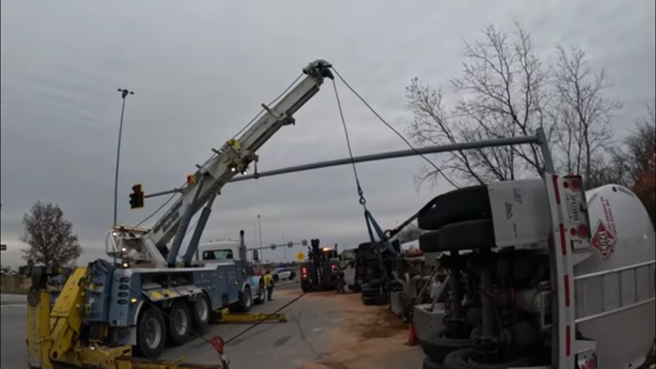 FUEL TANKER ROLLED OVER!!! truck and trailer rolled over on entrance ramp full of fuel.