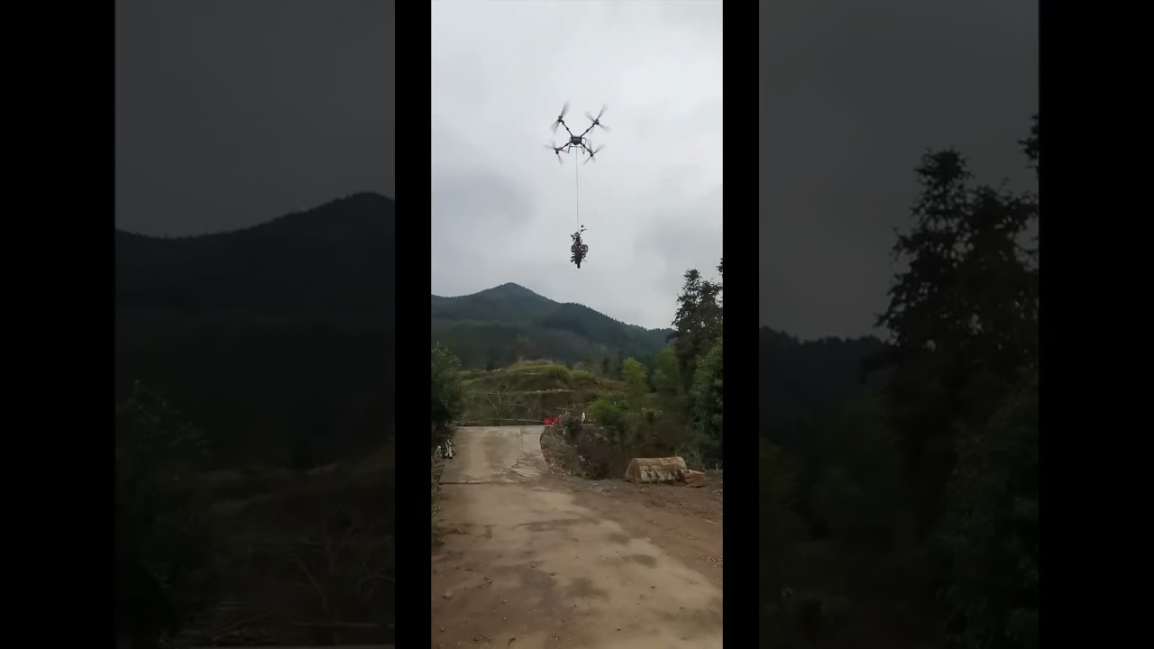 The process of using a drone to transport a motorcycle.