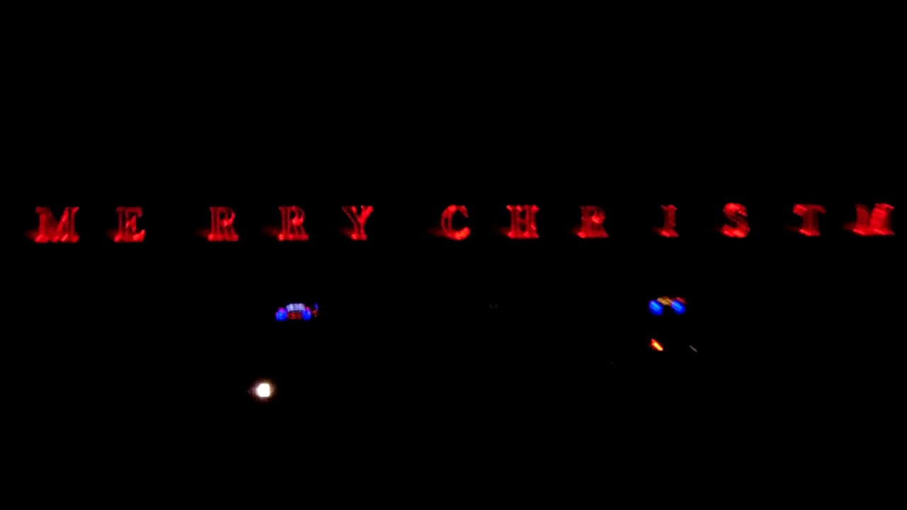MERRY CHRISTMAS HUGE LETTERS IN New Hampshire Motor Speedway CARS RACING ON THE TRACK - CHINO PIFF