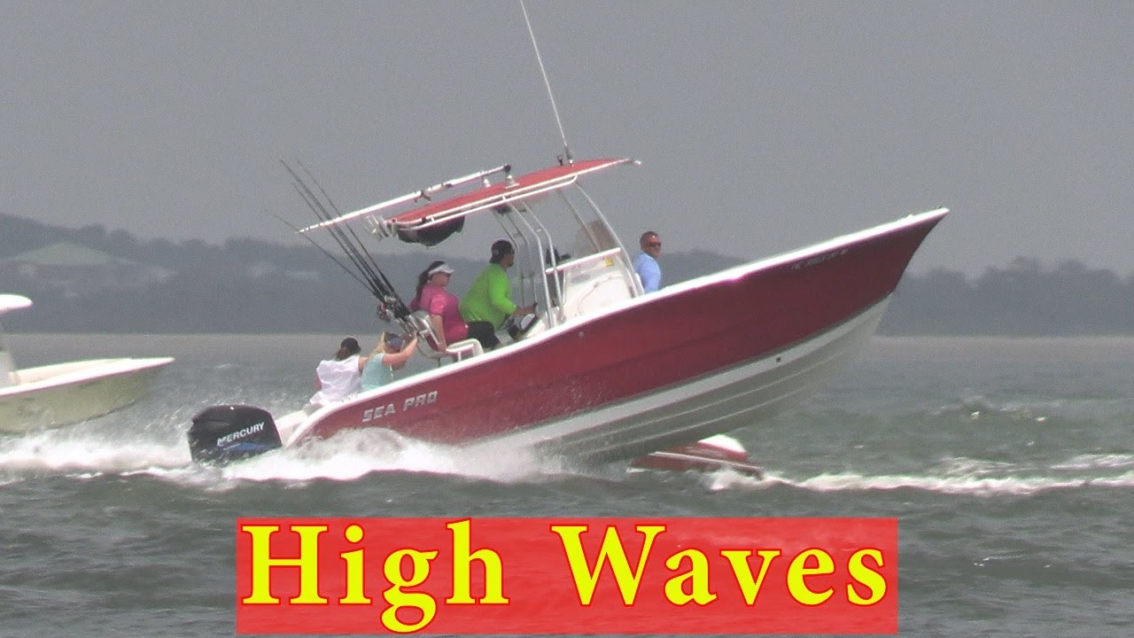 🌊 **Boats Braving Beaufort Inlet: High Winds & Rough Surf Challenges!** 🌬️
