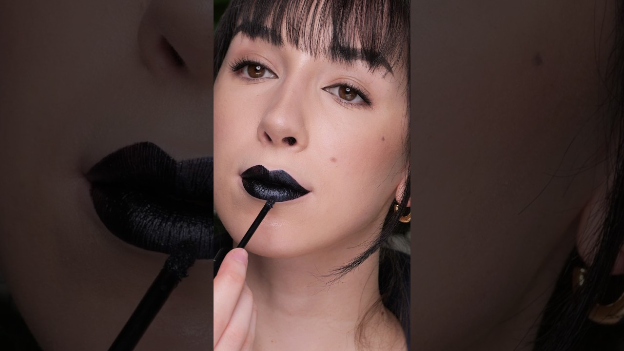 Black Moon Cosmetics Black Metal Liquid Lipstick in shade Sorrow dark blue black lipstick