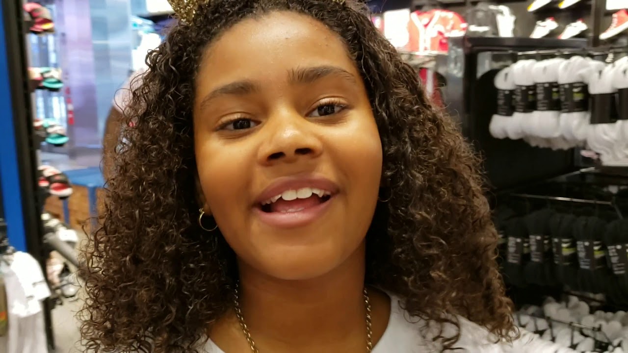 Shopping in Footlocker for new kicks