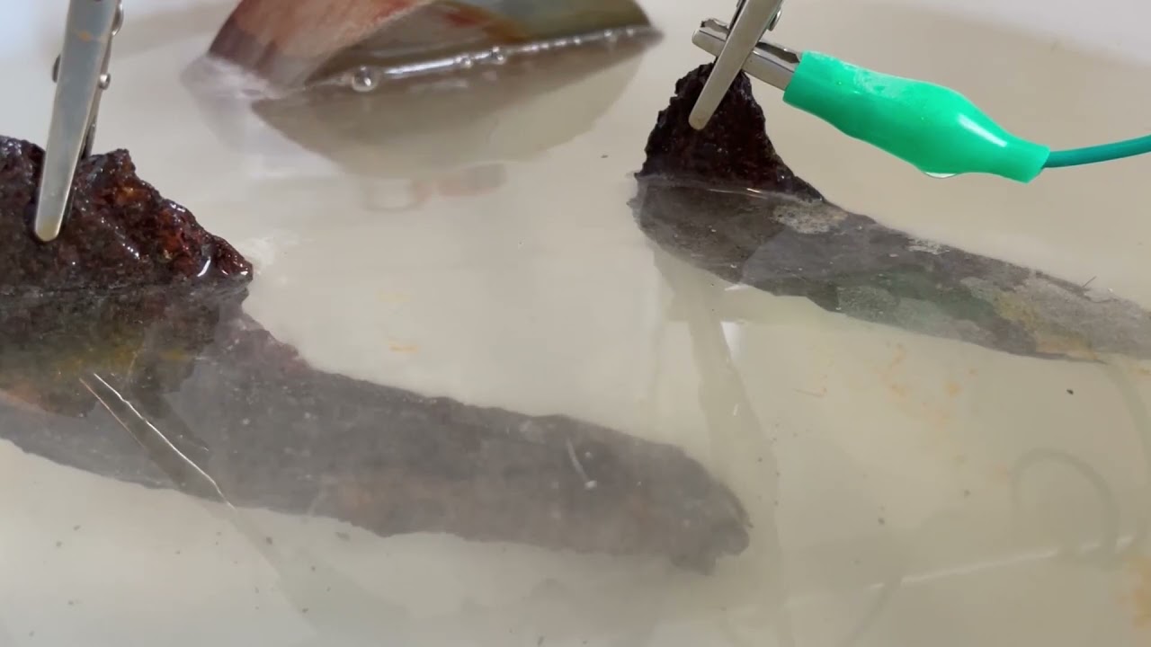 Rust Removal and Cleaning of two Ancient, Broken Horseshoes