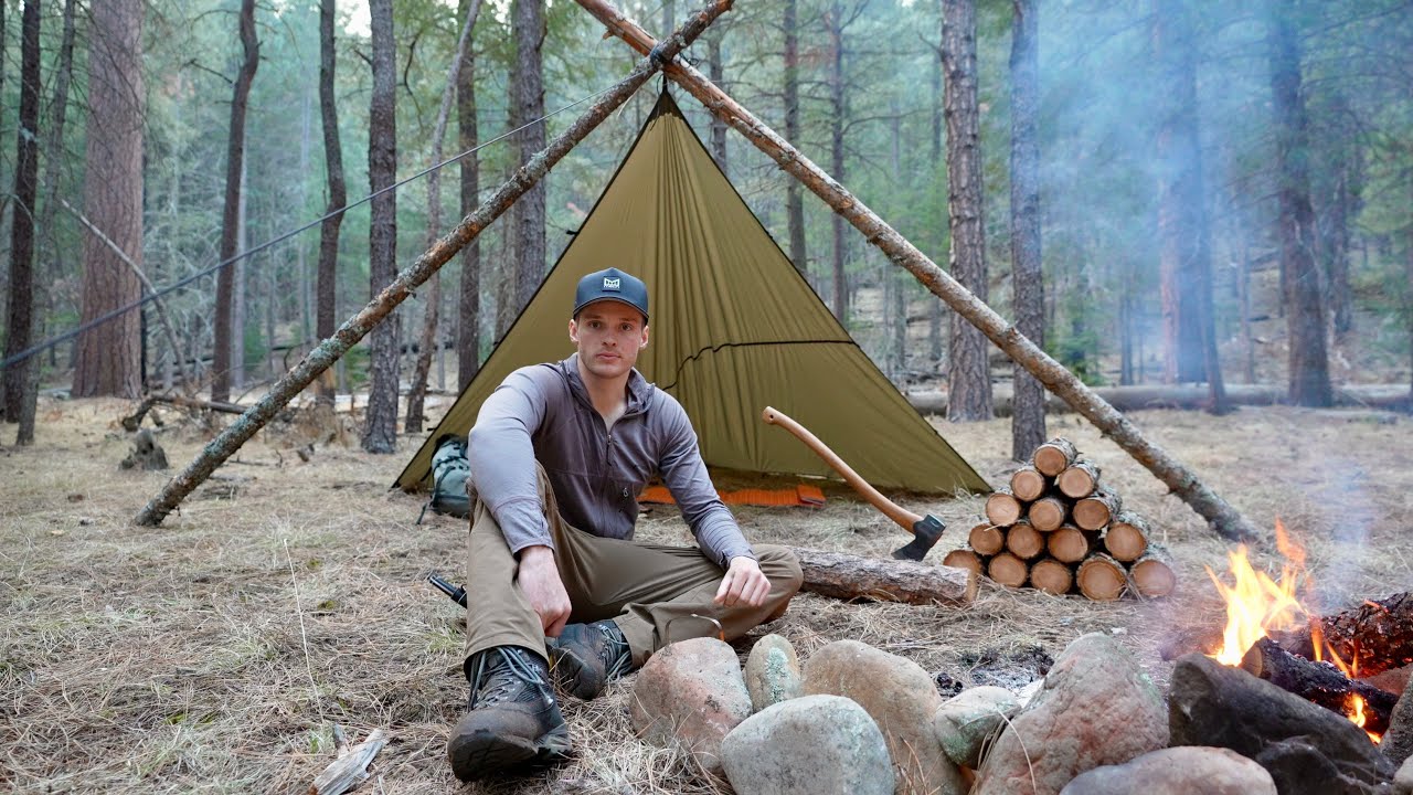 Bushcraft Tarp Shelter in a Remote Forest