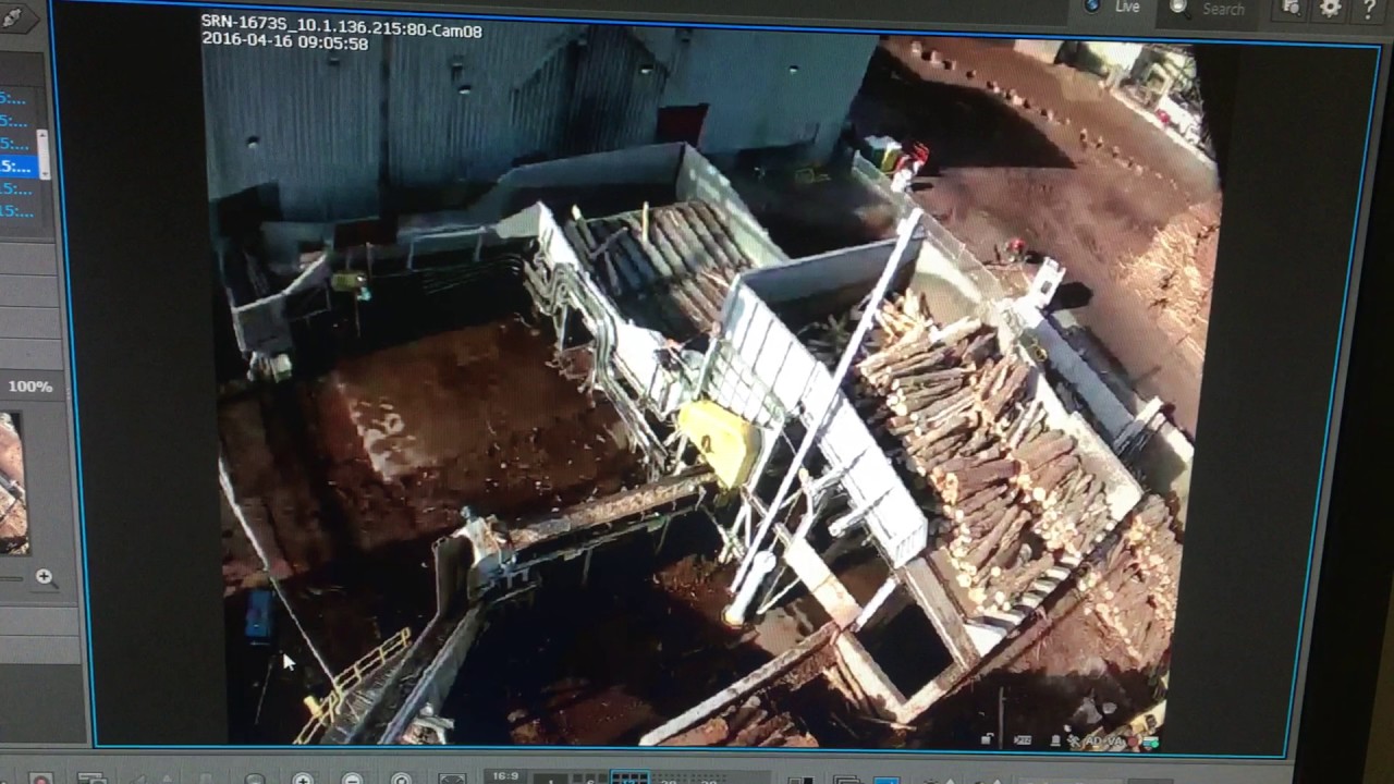 Rotary Debarker - Birds Eye View Of Discharge And Reloading Cycle Of Side Discharge Debarker