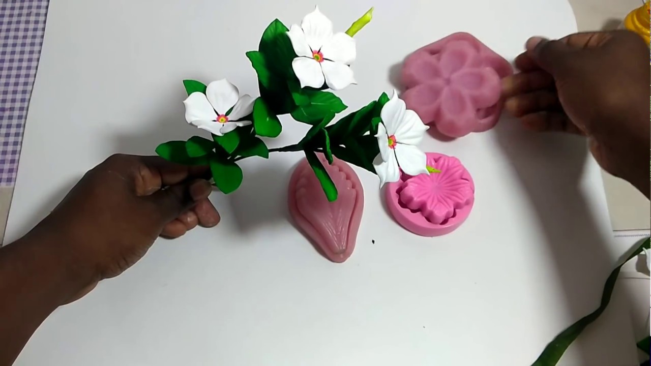 Flor de infância- vinca em Eva- Criação Jociara Santos