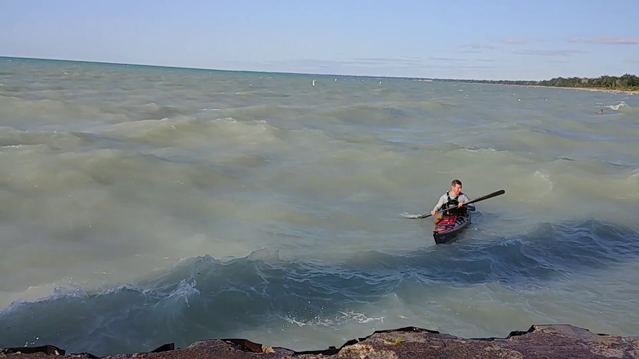 Playing in the grand bend rough water in a Zegul kayak