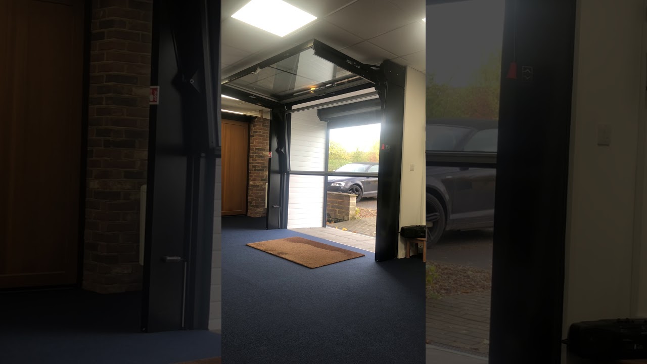Fully glazed Delta Overlap showroom door