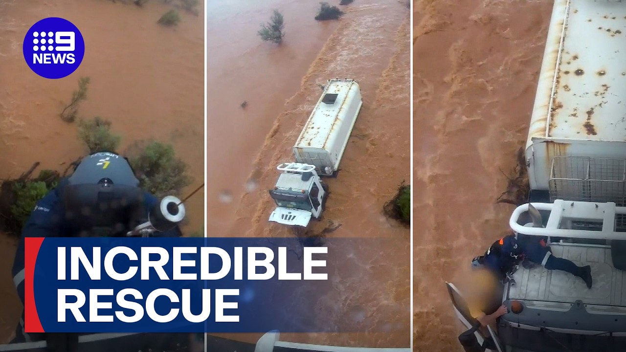 Vision captures truck driver's helicopter rescue in dangerous floodwaters | 9 News Australia