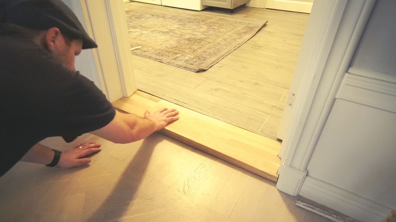 Monterar tröskel och dörr!