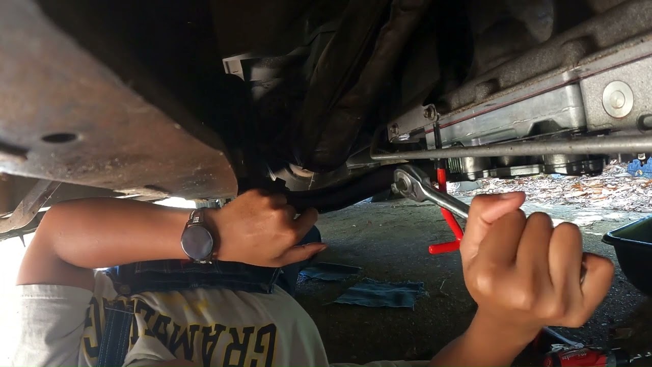 fixing stripped transmission pan bolts in the vehicle
