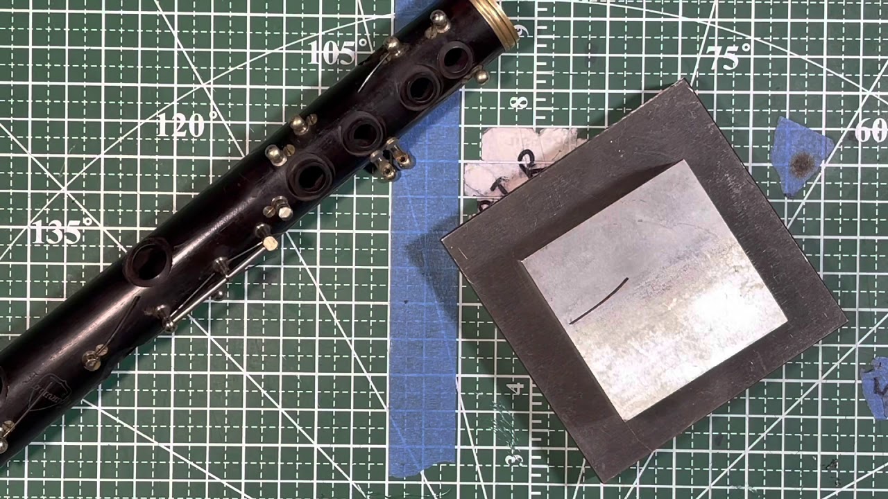 Oh the struggle! Replacing a clarinet key spring.