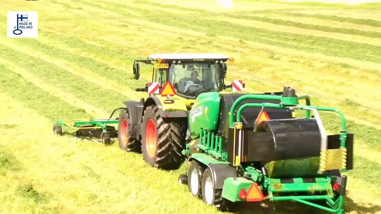 Agronic AMC Combination Baler  and WR500 Rake in action .