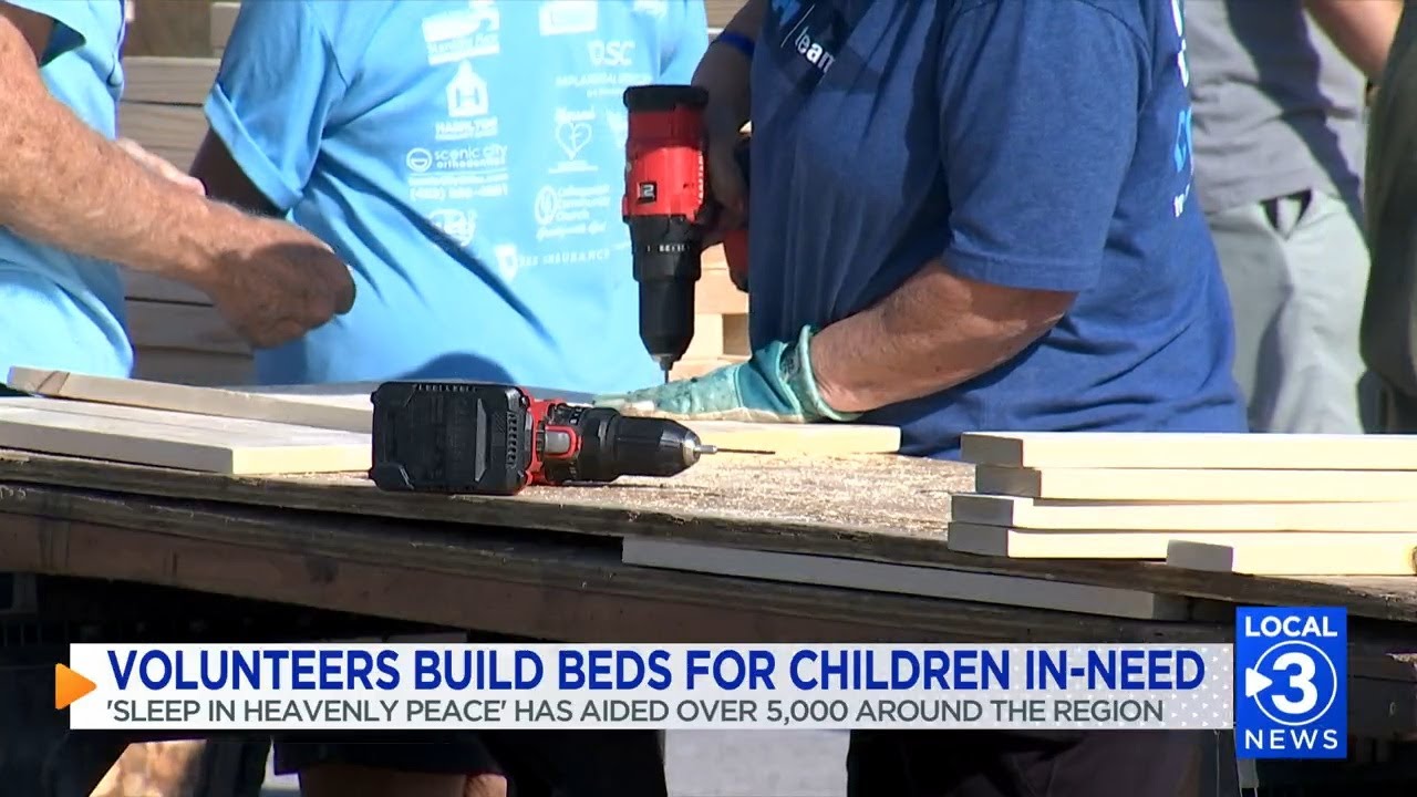 Nonprofit volunteers build beds for local children