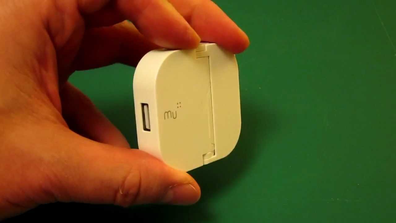 From open to closed flat - MU folding USB adaptor. MU Folding plug design. USB charger UK Flat plug.