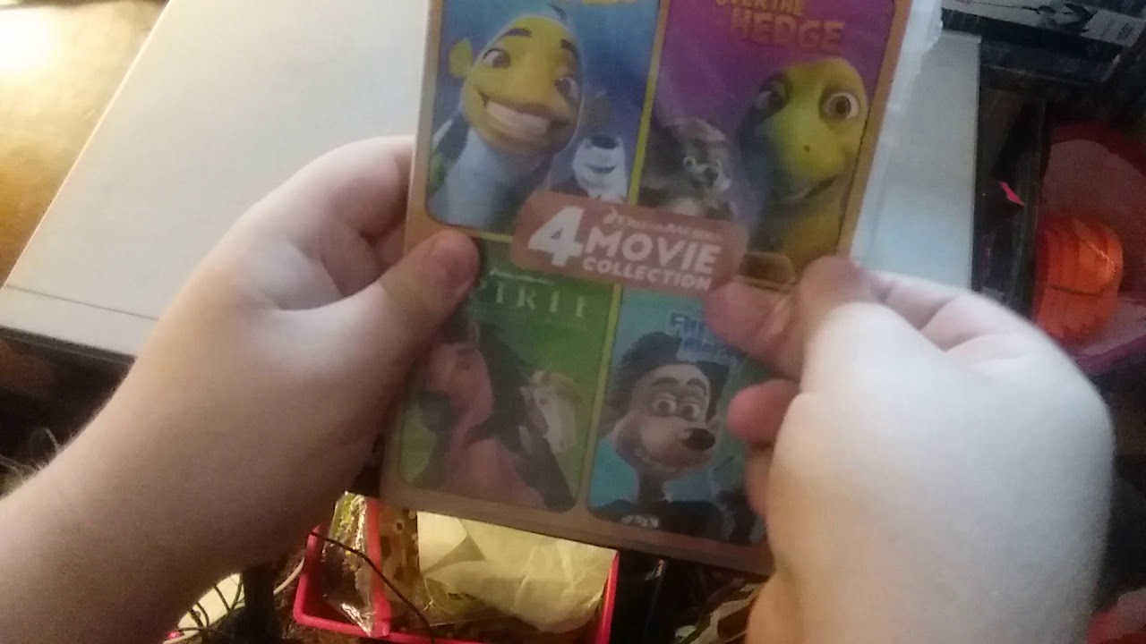 Распаковка DVD-издания коллекции из 4 фильмов DreamWorks.
