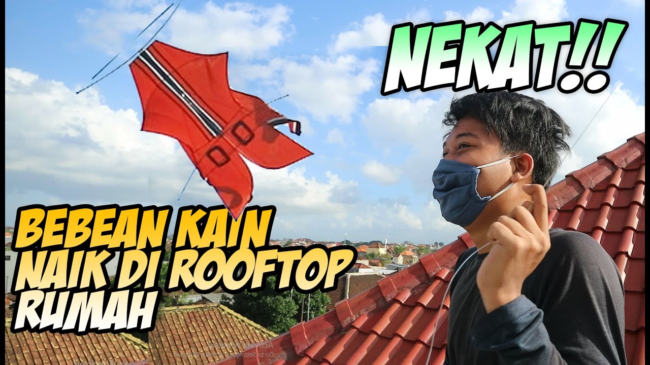 NEKAT!! Layangan Bebean Kain Naik di Atas Atap Rumah Lantai 2