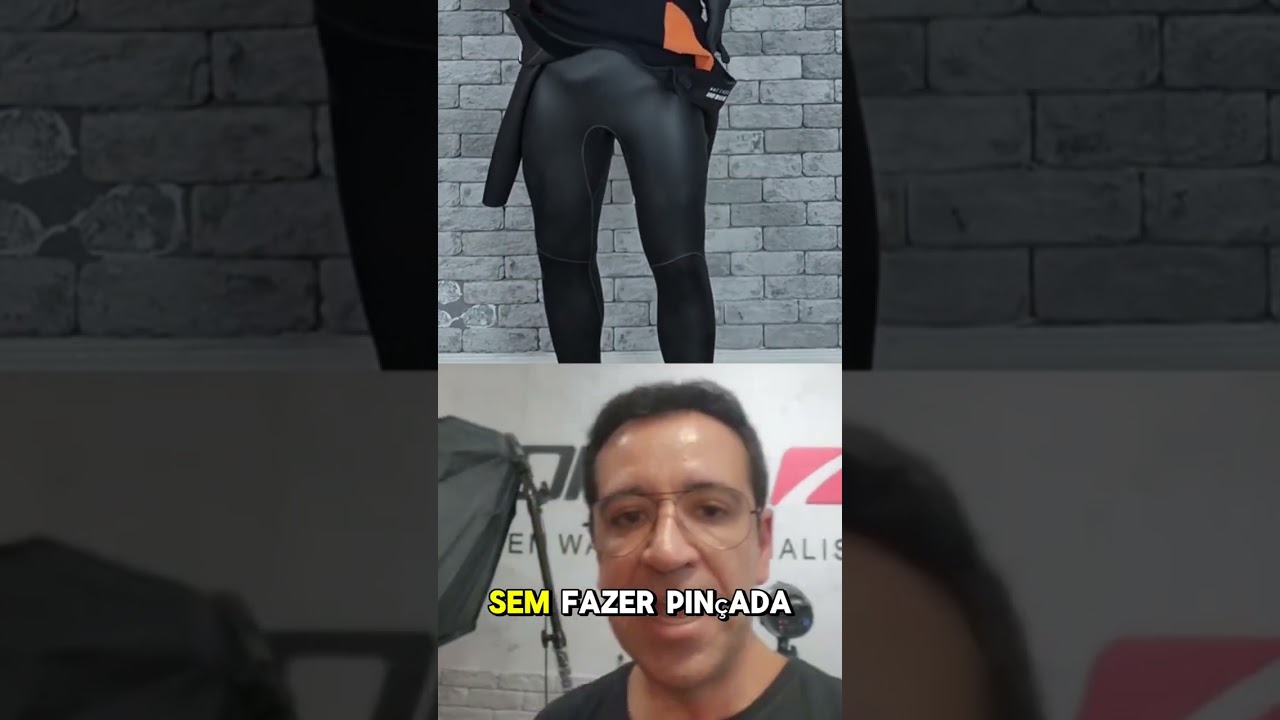 Roupa de borracha corrigindo o 