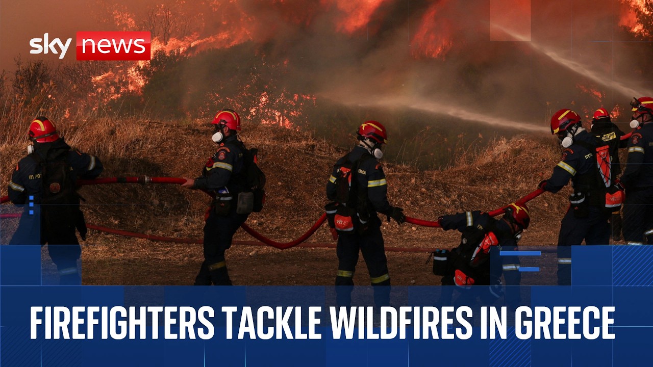 Firefighters tackle wildfires in Athens
