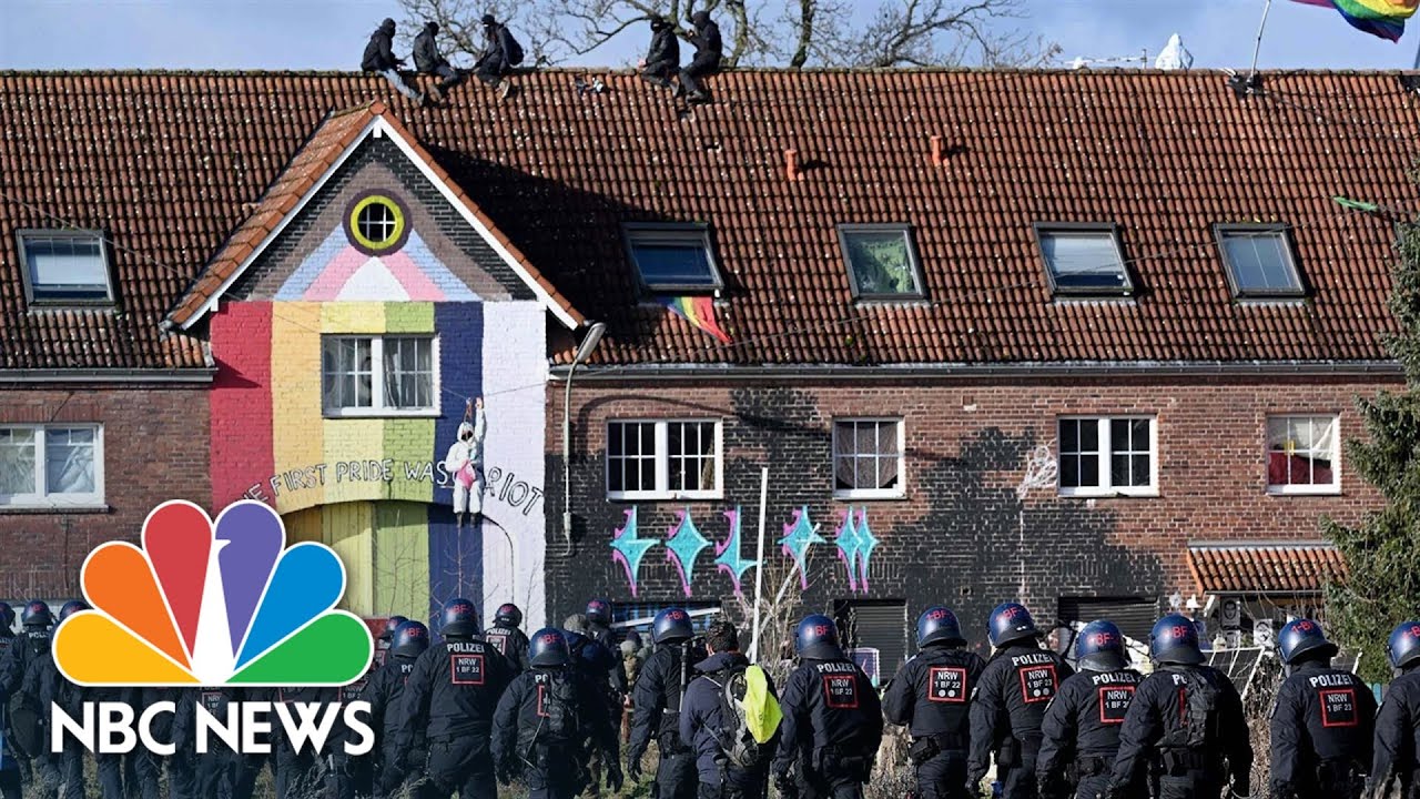Police begin to clear climate change activists from German village earmarked for demolition