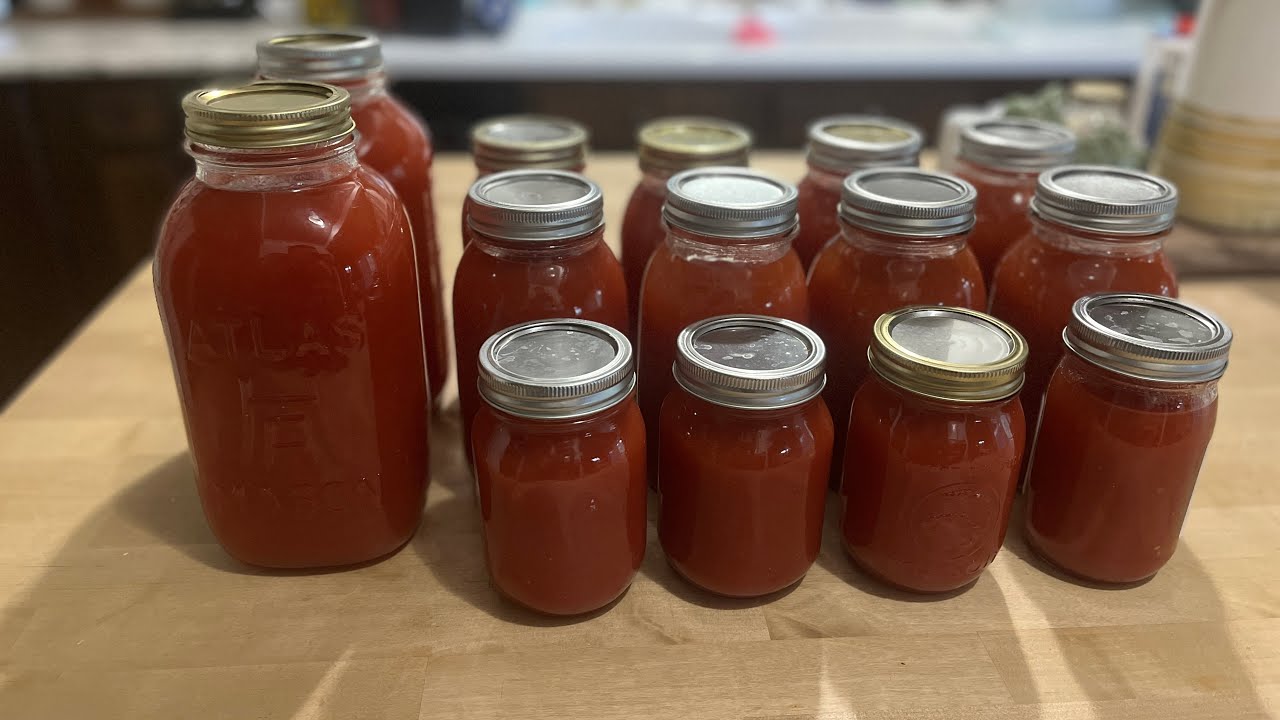 CANNING TOMATO JUICE!    Kitchen Aid food strainer makes fast work of it!